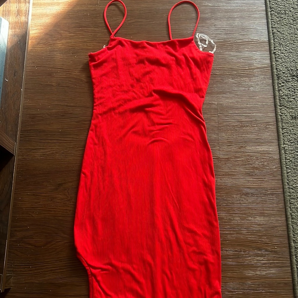 Maxi red dress with skinny straps, this is a size small. Very stretchy as well